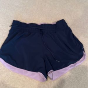 Lululemon women’s shorts. Reversible navy/pink